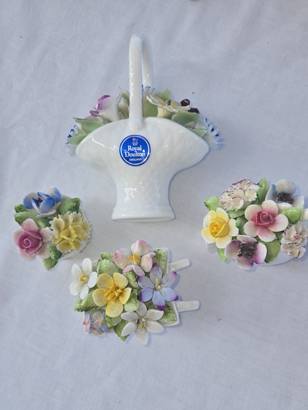 Royal Doulton 4 PC.Set Of White Porcelain with Multicolored Hand-Painted Flowers